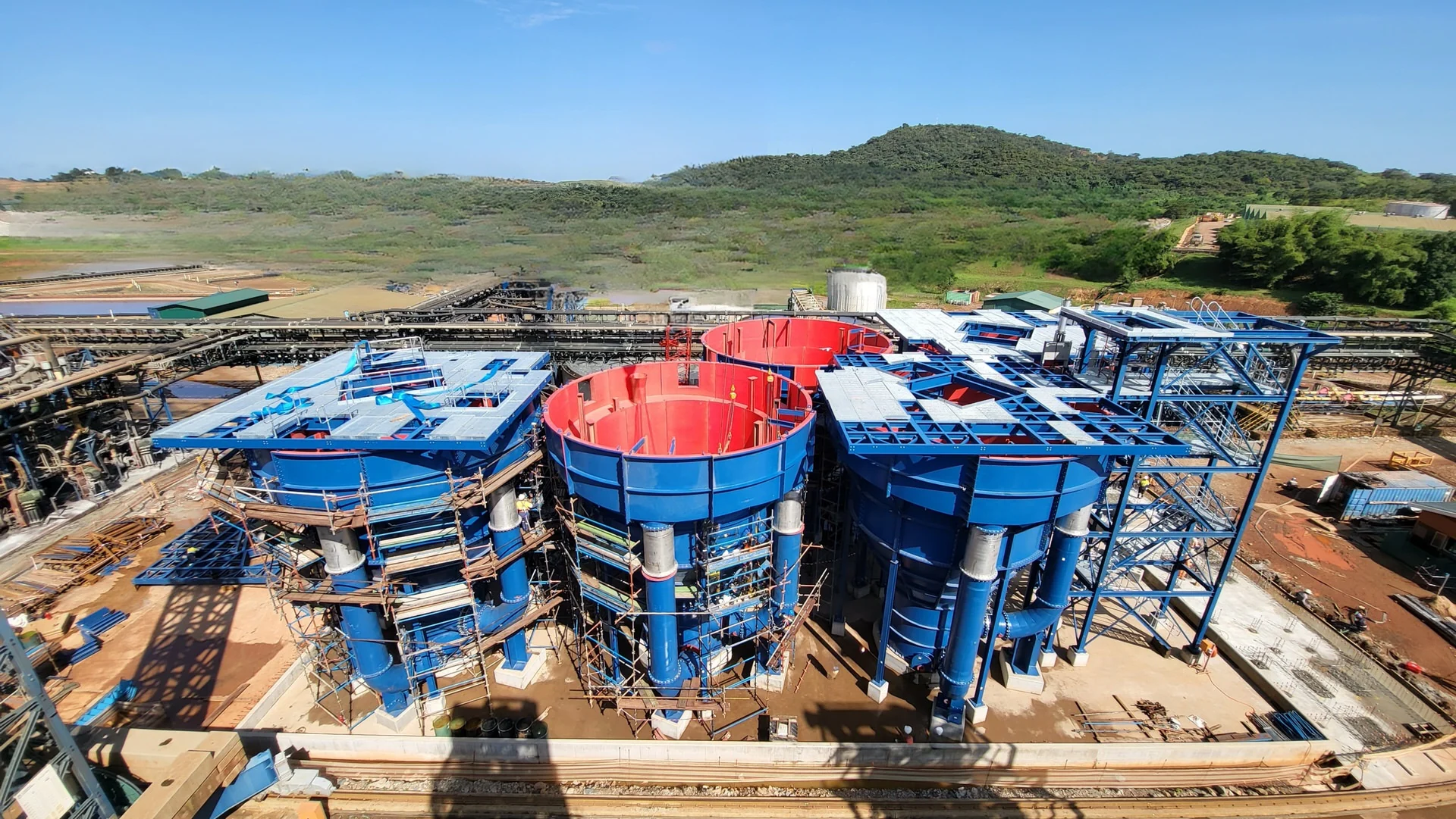 Aerial construction-stage view of multiple AZTEC UpFlow Reactor vessels